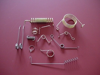 "Torsion spring / screw recoil spring"